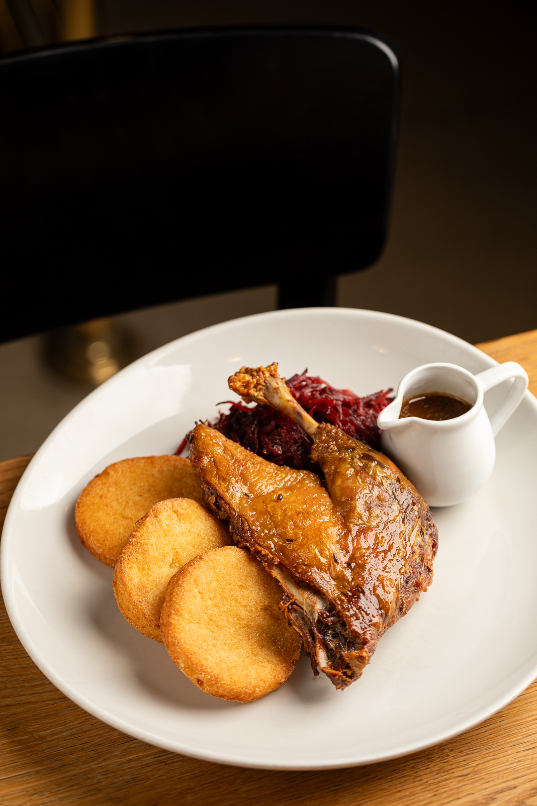 Duck confit with potato cakes and red cabbage.